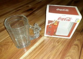 L) Coca Cola Clear Glass Mug - Shaped Like A Coke Machine - Has A Santa Claus