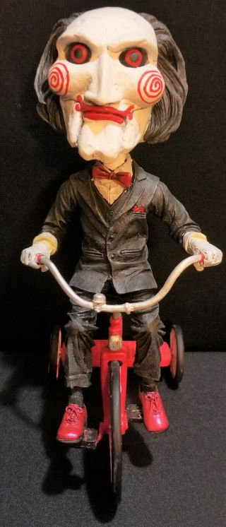 Neca - Reel Toys - Saw Billy The Puppet W/ Tricycle Head Knocker Bobblehead Rare