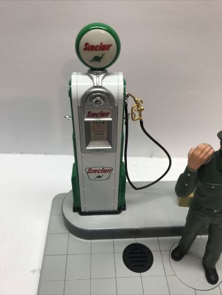 SINCLAIR BANK,  STANDING DISPLAY,  MAN W/ GAS PUMP,  & OIL CANS,  LIMITED EDITION 2