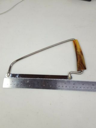 Vintage Kitchen Bone And Meat Saw Brown Bakelite Marbled Handle Stainless Blade