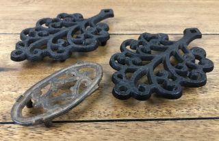 Vintage Cast Iron Trivets Footed Set Of Two 5 1/4 Inch Cast And One 3 Inch Spoon