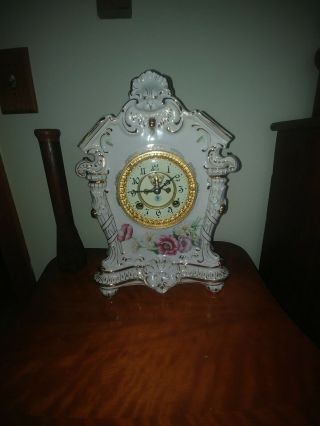 Porcelain Time & Strike Clock W/open Escapement.  Floral Case