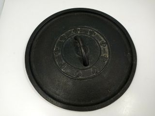 Antique Cast Iron Lid.  Measures 11 1/2 " Handle Has A Crack But Is Solid