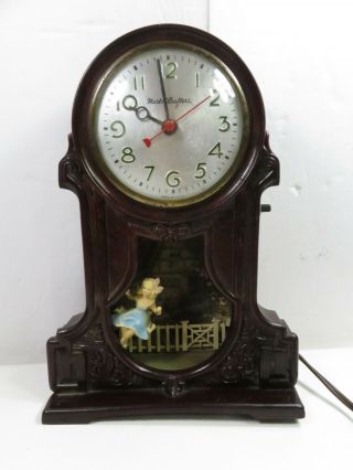 Master Crafters Girl In Swing Electric Clock Dark Brown The Clock Does.  Work