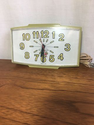Retro Mid Century Modern General Electric Yellow Wall Clock,  Model 2190 (c)