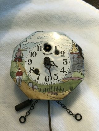 1930 Lux Porcelain Dutch Man & Boat Scene Pendulette Novelty Clock