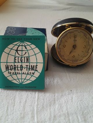 1970’s Elgin Japan Made World Time Folding Travel Alarm Clock.  Runs
