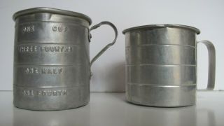 2 Antique Tin Measuring Cups