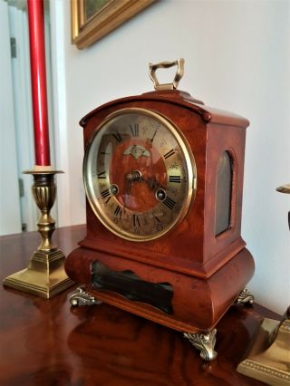 A Burr Walnut Cased Ormolu Mounted Mantel Clock By Wuba.