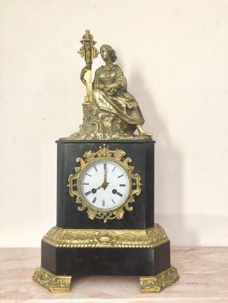 French Gilt Bronze And Black Slate Figural Mantle Clock By Ad Moughin.