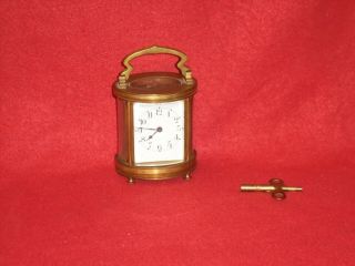 1890 French Signed Oval Brass Carriage Clock With Beveled Oval Glass