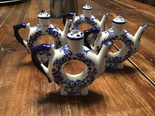 Set Of 4 Ceramic Tea Pot Napkin Rings