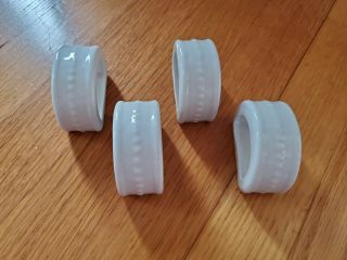Set Of 4 White Ceramic Napkin Ring Holders
