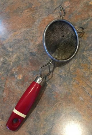 Vintage Ajax Heavy Duty Strainer With A Red Wooden Handle -