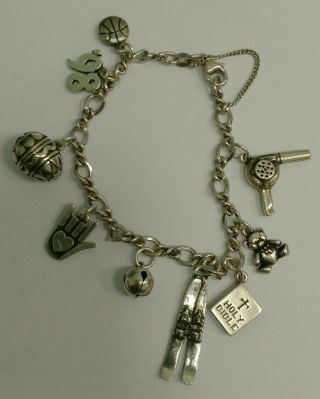 Sterling Silver James Avery Charm Bracelet 6.  75 " With 8 Different Avery Charms