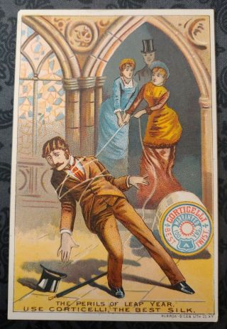 Trade Card Corticelli Spool Silk & Twist - " The Perils Of Leap Year " Man Roped