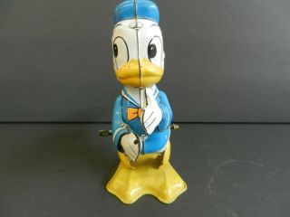Line Mar Metal Donald Duck Tail Twirling Wind Up Toy