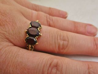 An Attractive Fully Hallmarked 9ct Gold Garnet Trilogy Set Ring - Uk Size: N.