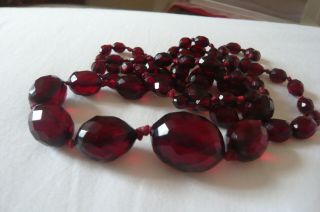 Art Deco Hand Knotted Faceted Cherry Amber Bakerlite Necklace 60 Grams