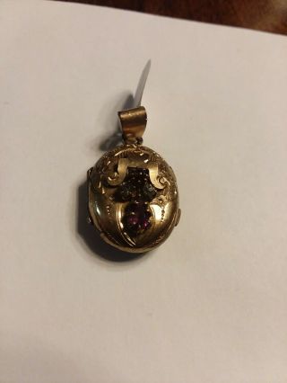 Pretty Victorian Era Gold Filled Locket With Garnets And Tiny Diamonds.