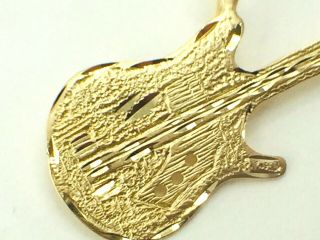 Fine 14K yellow gold Electric Guitar diamond cut Florentine finishing charm.  2. 3