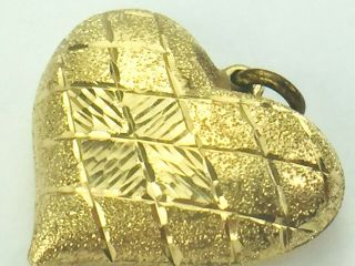 14k yellow gold Florentine Puffy Heart with diamond cut etching charm 2.  6gm, 3