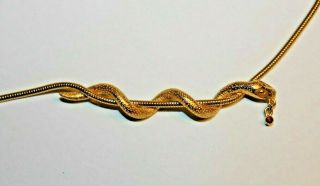 Cute And Fun Crown Trifari Signed Gold Tone Snake Necklace With Red Stone