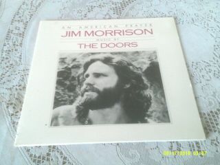 Jim Morrison.  An American Prayer.  Music By The Doors.  Gatefold.  Booklet.
