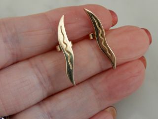 A Heavy 9 Ct Gold Wave Design Earrings