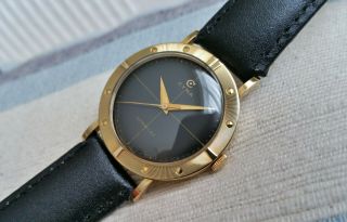 Vintage Swiss Cyma mechanical men ' s watch,  18k solid gold,  black dial,  runs 2