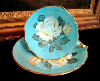 Paragon Vintage Yellow Tinted White Cabbage Rose On Turquoise Tea Cup & Saucer