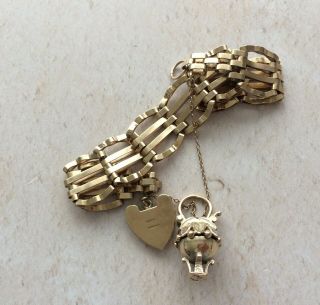 19.  17gr 375 9ct scrap gold,  bracelet with two charms,  vintage scrap gold,  9 carat 3