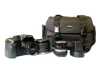 Panasonic Lumix Gh3,  4 Vintage Lenses,  2 Batteries,  Camera Bag