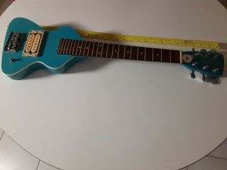 Vintage Turquoise Chiquita Small Travel Electric Guitar