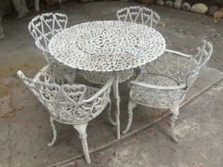 Vintage Garden Table And Matching Chairs