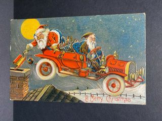 Vintage Postcard1908 Christmas Santa In Flying Car Driven By Grumpy Elf Embossed