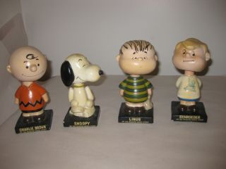 4 Vintage Peanuts Comic Strip Bobble Head Nodder Charlie Brown Linus Snoopy Lego