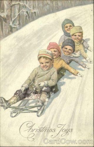 Christmas Children K.  Feiertag Boys On Sled Antique Postcard Vintage Post Card