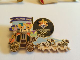 2002 Salt Lake Olympic Pin Mascots Stagecoach Moving Wheels