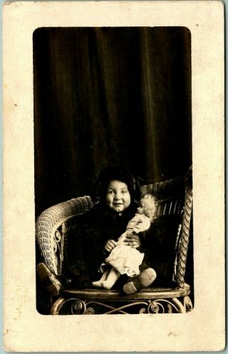 Vintage Rppc Studio Photo Postcard Very Cute Little Girl W/ Doll In Wicker Chair