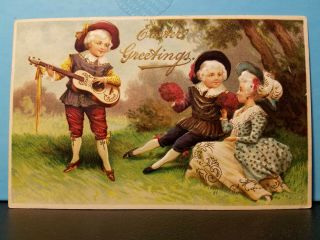 1912? Vintage Postcard Easter Greetings Raised Couple Being Serenaded Gold Gilt