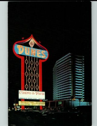 Vintage Dunes Hotel Postcard Casino De Paris Nighttime Neon Las Vegas Strip Nv