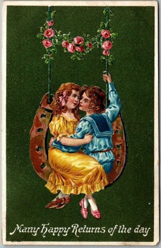 Vintage Happy Year Postcard Boy & Girl Sitting In Golden Horseshoe C1910s