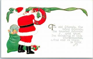 Vintage 1910s Christmas Embossed Postcard Santa Claus / Red Wreath -
