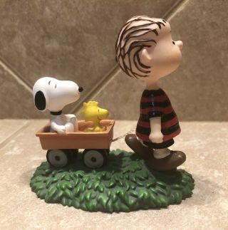 Westland Peanuts - Linus Pulling Snoopy & Woodstock In Wagon Figurine 8273