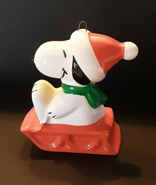 Vintage Peanuts Snoopy On A Sled Ceramic Christmas Ornament