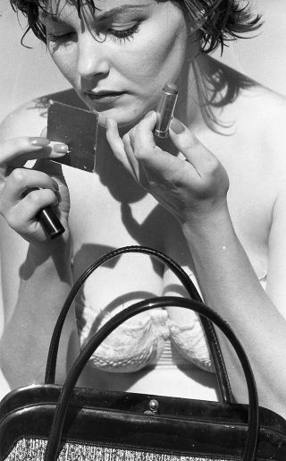 1950s Negative,  Sexy Pin - Up Girl Beatrice Stevens Doing Her Make - Up T416893