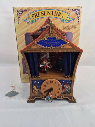 Enesco Disney Pinocchio Illuminated Deluxe Action Musical Clock Figurine