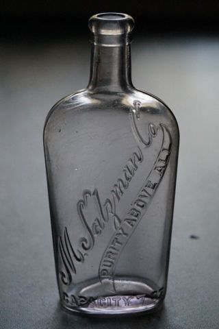 Antique Strap Sided Half Pint Whiskey Flask - M.  Salzman Co.