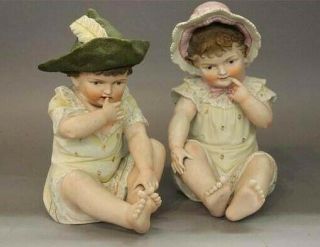 Germany 2 Lg.  Antique Hp,  Bisque Porcelain Piano Babies Boy&girl Doll/figurines.